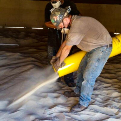 Placing sand with a Slim Chute.