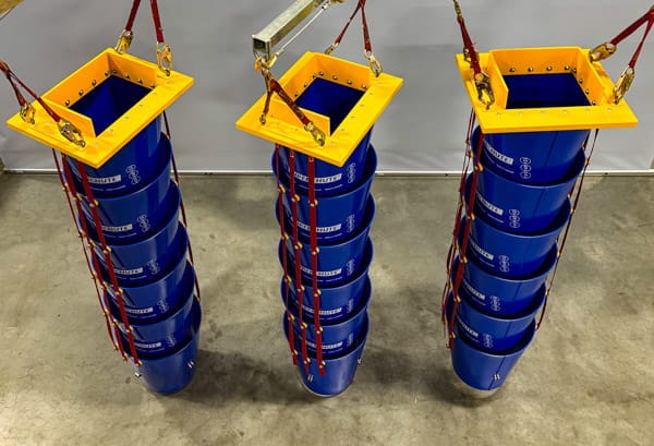 Three blue Slim Chutes with custom flanges.